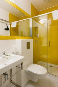 Kúpeľňa v ubytovaní Hotel Willa Odkrywców