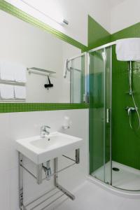 Kúpeľňa v ubytovaní Hotel Willa Odkrywców
