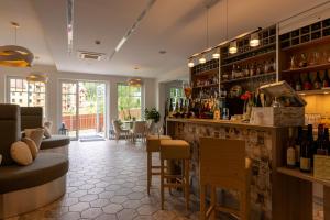 Nápoje v ubytovaní Hotel Willa Odkrywców