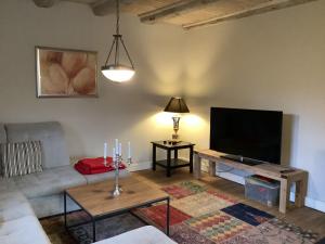 TV a/nebo společenská místnost v ubytování Haus West