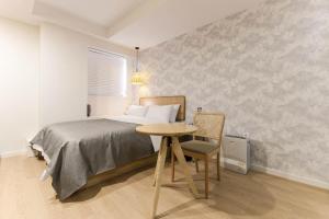 Arentz Hotel客房内的一张或多张床位