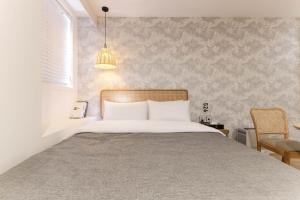 Arentz Hotel客房内的一张或多张床位