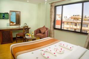 Ένα ή περισσότερα κρεβάτια σε δωμάτιο στο Samsara Boutique Hotel