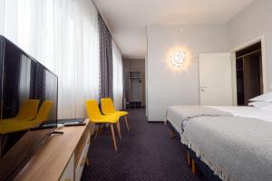 TV a/nebo společenská místnost v ubytování Centrum Hotel Viljandi