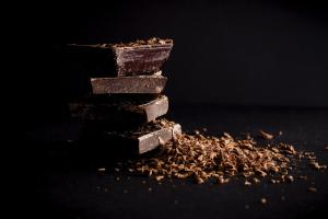 a pile of chocolate chips on a table at Holiday Inn - the niu, Yen Hamburg City by IHG in Hamburg