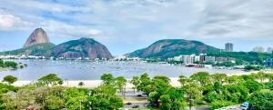 a view of a river with a city and mountains at Pão de Açúcar in Rio de Janeiro