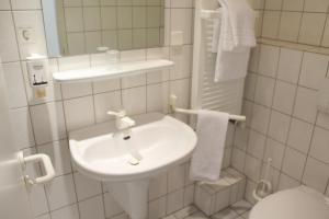 Ein Badezimmer in der Unterkunft Hotel Elbroich