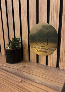 Um certificado, prémio, placa ou documento mostrado em Apartmani Planina Divčibare