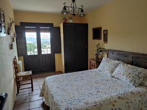 Casa Rural El Botánico客房内的一张或多张床位