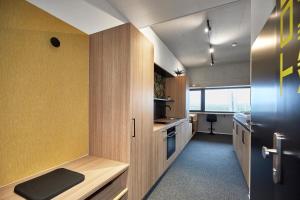O bucătărie sau chicinetă la miniLOFT apartments Leonding