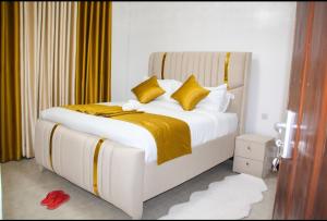 Ένα ή περισσότερα κρεβάτια σε δωμάτιο στο Haven Cozy Apartments