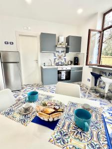 Kuchyň nebo kuchyňský kout v ubytování The wind rose