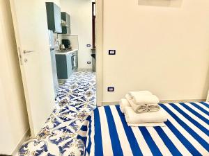 Postel nebo postele na pokoji v ubytování The wind rose