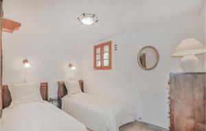 Posteľ alebo postele v izbe v ubytovaní 3 Bedroom Cozy Home In Taulis