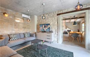 a living room with a couch and a table at Villa Kalu in Rovinj