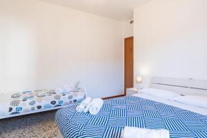 Postel nebo postele na pokoji v ubytování Bellavista - Residence in Barzio center near free ski shuttle