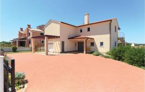 dom z podjazdem z czerwonej cegły w obiekcie Holiday Home Volme w Puli +31 zdjęć