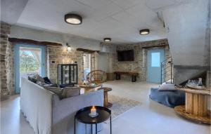 a living room with a couch and a table at Villa Casa Jovanin in Motovun +52 photos