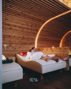 Voodi või voodid majutusasutuse Hotel Tyrol am Haldensee toas