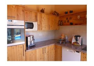 Kuchyň nebo kuchyňský kout v ubytování Finca La Bonita