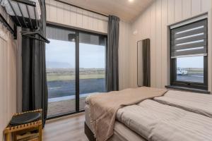Cozy and Modern Cabins in Selfoss客房内的一张或多张床位