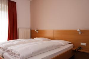 Postel nebo postele na pokoji v ubytování Altstadthotel Wetzel
