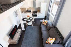 Kuchyň nebo kuchyňský kout v ubytování Modern loft-apartments in Prague