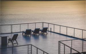 a group of chairs sitting on top of a cruise ship at Villa Grace in Jadranovo