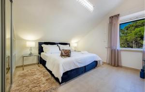 Ένα ή περισσότερα κρεβάτια σε δωμάτιο στο Villa Petrus