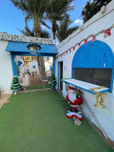 a ping pong table in front of a building at Auski Hostel Dahab in Dahab