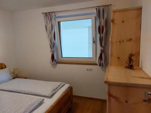 Posteľ alebo postele v izbe v ubytovaní Ferienwohnung Gstreinthaler