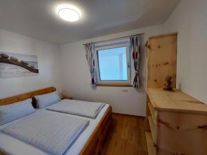 Posteľ alebo postele v izbe v ubytovaní Ferienwohnung Gstreinthaler