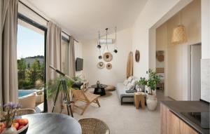 a living room with a couch and a table at Villa Eco in Orbani