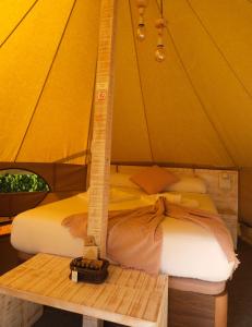 Cama o camas de una habitación en Glamping Illa de Arousa