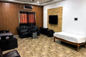 TV a/nebo společenská místnost v ubytování Stone Yard Resort