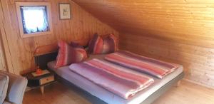Ένα ή περισσότερα κρεβάτια σε δωμάτιο στο Ferienhaus 146