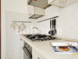 Kuchyň nebo kuchyňský kout v ubytování Holiday Apartment Tortoreto Lido codice T9