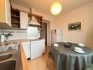 Kuchyň nebo kuchyňský kout v ubytování Appartement le Theven