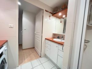 Kuchyň nebo kuchyňský kout v ubytování Appartement le Theven