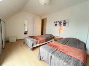 Postel nebo postele na pokoji v ubytování Appartement le Theven