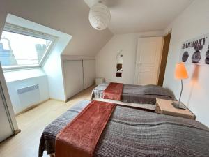 Postel nebo postele na pokoji v ubytování Appartement le Theven