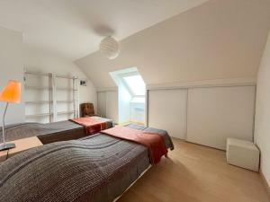 Postel nebo postele na pokoji v ubytování Appartement le Theven