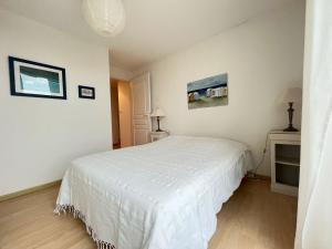 Postel nebo postele na pokoji v ubytování Appartement le Theven