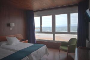 Postel nebo postele na pokoji v ubytování Hotel Josein