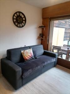 Posedenie v ubytovaní Appartement aux pieds des pistes / piscine