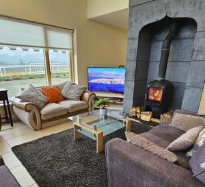 TV a/nebo společenská místnost v ubytování Ballycrystal House Getaway