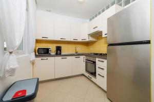 Küche/Küchenzeile in der Unterkunft Apartments Pinty