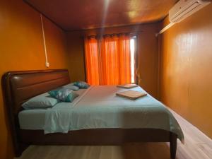Postel nebo postele na pokoji v ubytování Patcharin Homestay