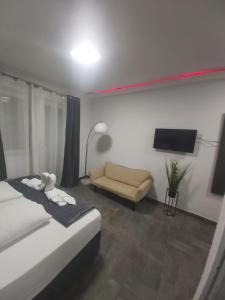 Ein Bett oder Betten in einem Zimmer der Unterkunft Panda Rooms