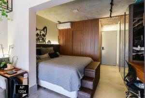 Ένα ή περισσότερα κρεβάτια σε δωμάτιο στο Studio 1204 Com Vista Livre e Andar Alto +26 φωτογραφίες
